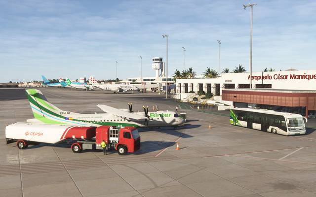 GCRR Lanzarote Airport - apron view with Binter aircraft and volcanic terrain