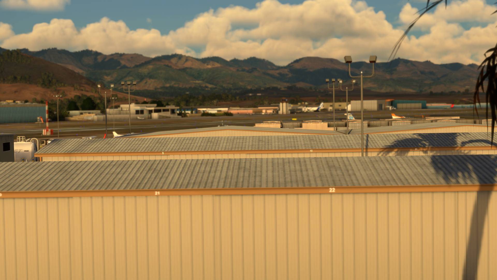 Hangar area overview with mountains in background